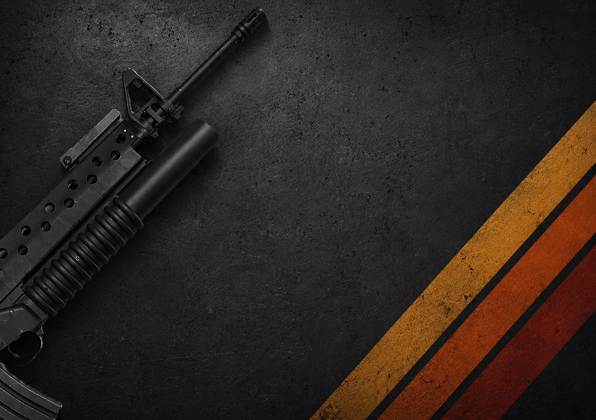 M203 grenade launcher with rifle handguard on a dark textured background with orange accent stripes.
